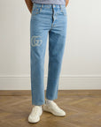 GUCCI
Tapered Logo-Print Jeans
