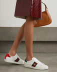 GUCCI
Sneakers in pelle ricamata con dettagli stampa serpente Ace