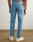 GUCCI
Tapered Logo-Print Jeans