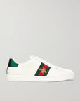 GUCCI
Sneakers in pelle ricamata con dettagli stampa serpente Ace