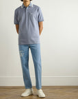 GUCCI
Tapered Logo-Print Jeans