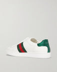 GUCCI
Sneakers in pelle ricamata con dettagli stampa serpente Ace
